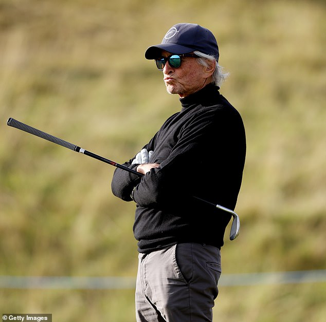 Michael Douglas seemed in a better mood than on Thursday when he was seen with his head in his hands.