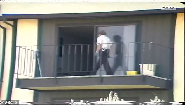 A police officer stands outside Helen Terry's apartment complex on Wyndham Drive in Sacramento.