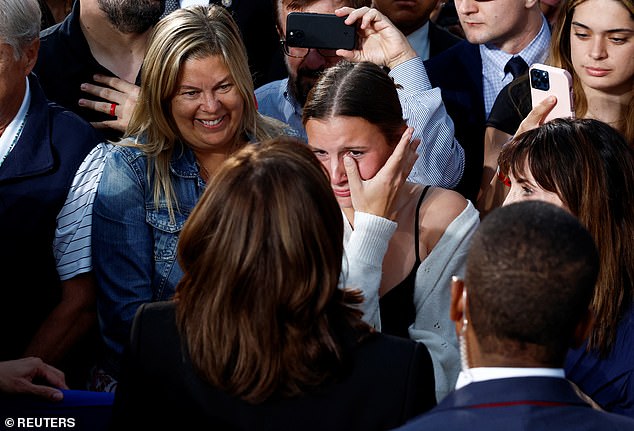 A woman wipes away tears as she comes face to face with the vice president during an emotional moment on the campaign trail.