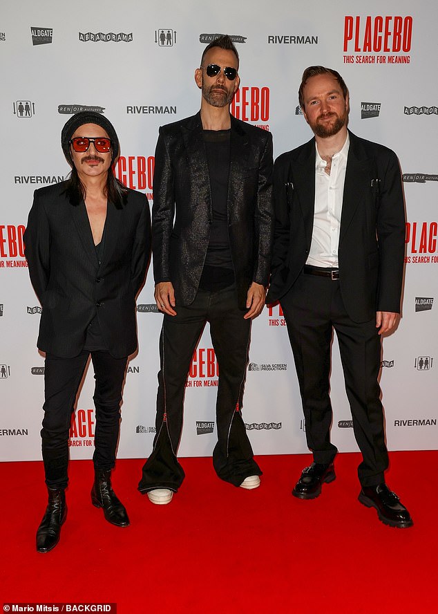 Robbie explained that the alternative band, made up of singer Brian Molko (left), bassist and guitarist Stefan Olsdal (center) had a profound impact on him.