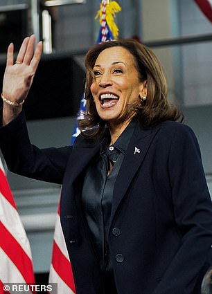 Vice President Kamala Harris takes the stage at a campaign event in suburban Detroit.