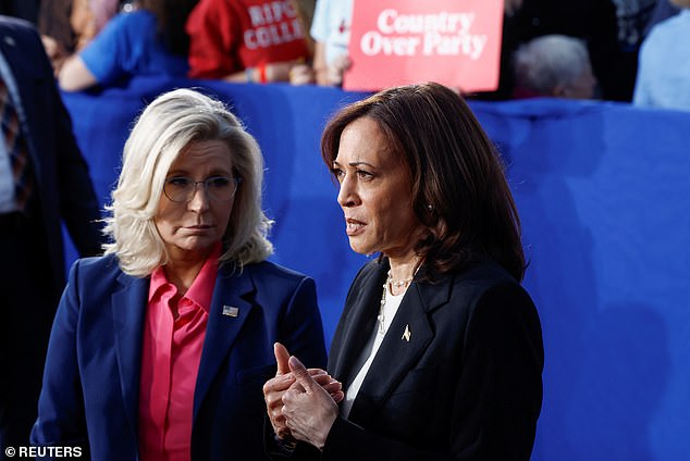 Democratic presidential candidate and United States Vice President Kamala Harris speaks as former Congresswoman Liz Cheney (R-WY) looks on