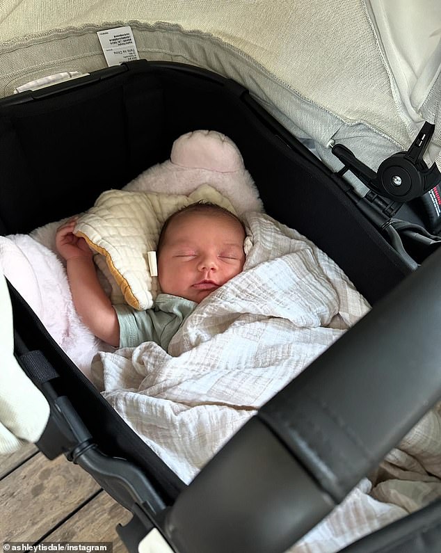 Emerson was the star of multiple solo photographs showing her wrapped in a blanket while lounging in her small bed, along with a photo of her in her stroller.