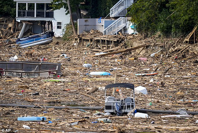 Debris is scattered in the lake after Hurricane Helene, Wednesday, Oct. 2, in Lake Lure.