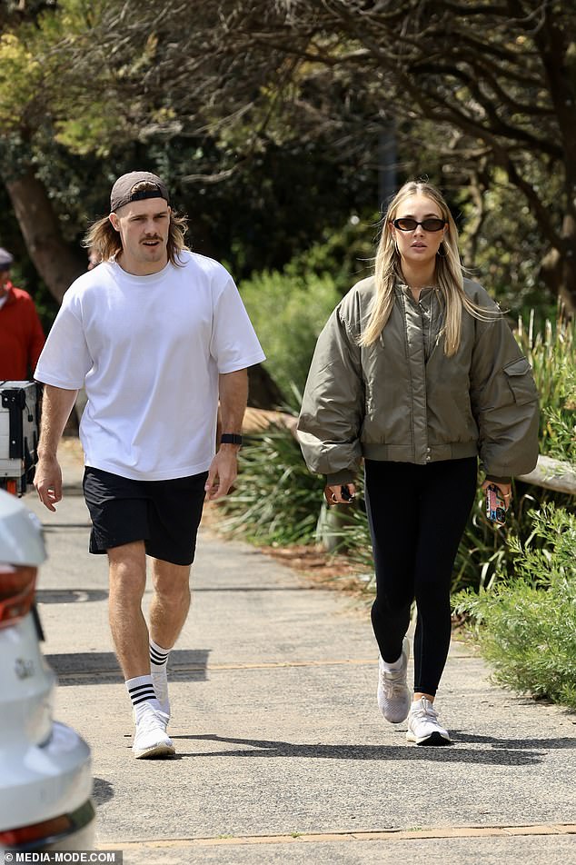 The Melbourne Storm star showed no signs of nerves ahead of the NRL Grand Final as he went for a stroll with his influencer girlfriend.