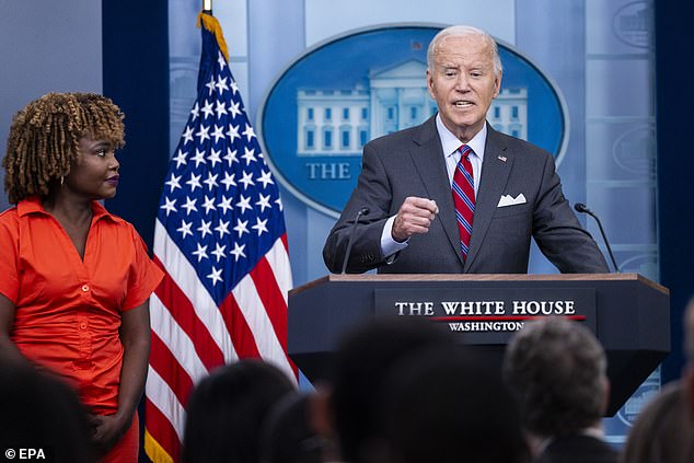 US President Joe Biden, along with White House Press Secretary Karine Jean-Pierre, answers a question from the media during the daily press briefing at the White House.