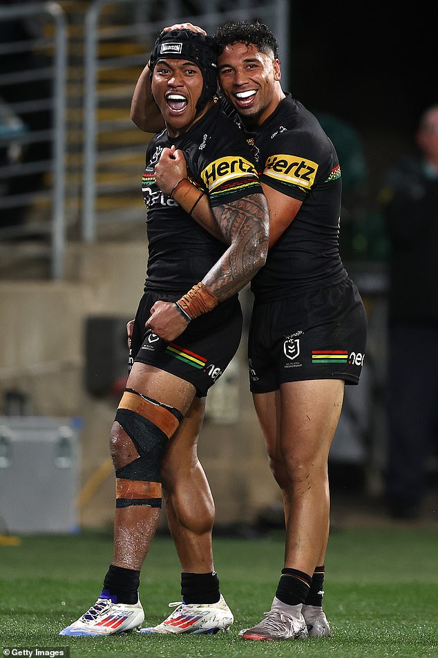 In the celebrations that followed, Jahrome Hughes appeared to mock the likes of Brian To'o (left) and former center Stephen Crichton for their Mt Druitt roots.