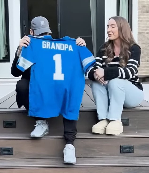 The day before, they were seen in Eminem's new music video for his song Temporary, and Hailie could be seen giving her father a Detroit Lions jersey with the word 