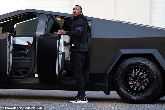 The comedian sported matching joggers and eye-catching high-top sneakers to complete his look.