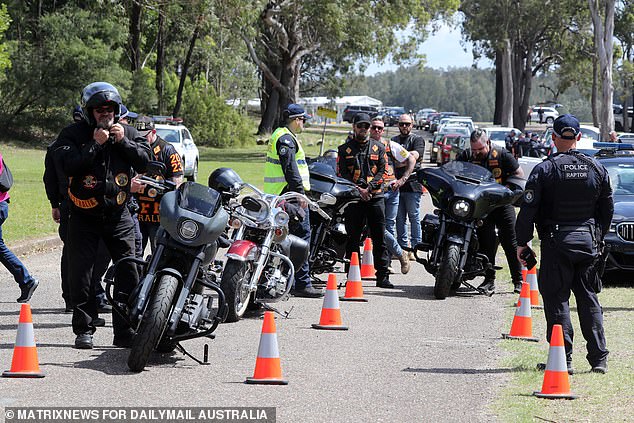 Officers marked two lanes of traffic each with orange cones.