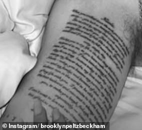 Brooklyn had his huge script of wedding vows adorned below his bicep.