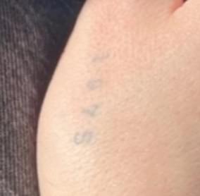 Brooklyn got her father's birth year tattooed above her thumb in a simplistic font