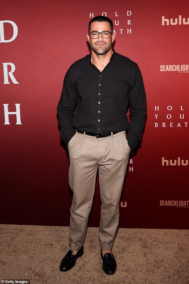 American actor Jesse Metcalfe looked dapper in a black shirt and light brown pants.