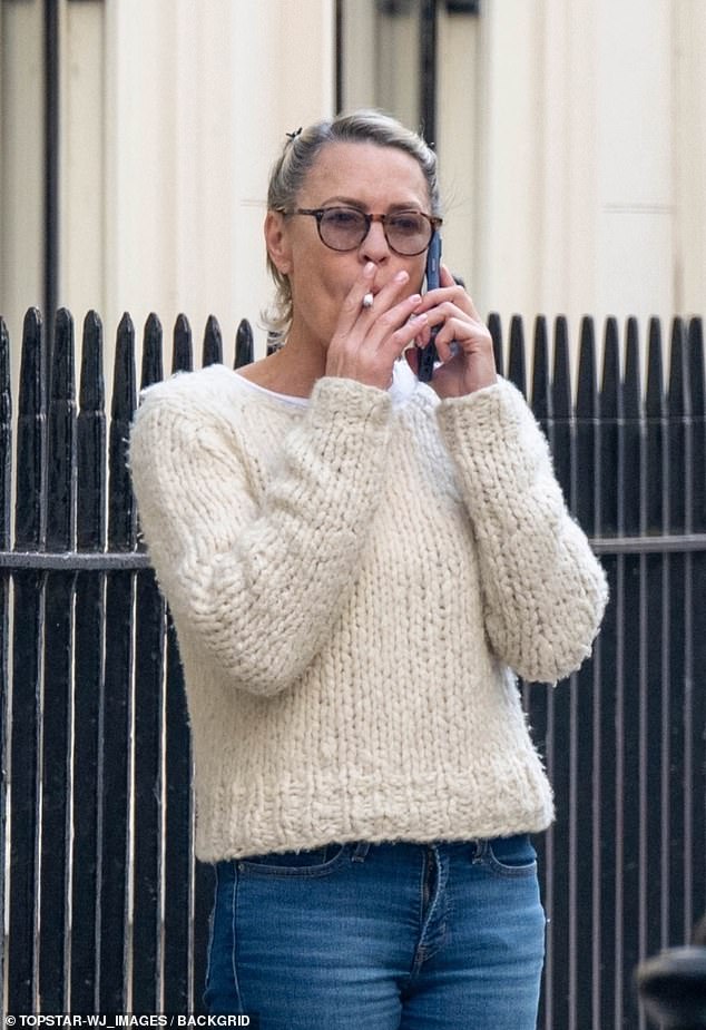 The Golden Globe winner, 58, looked almost unrecognizable as she strolled down the street smoking a cigarette in the heart of the UK capital, where she directs and stars in The Girlfriend.