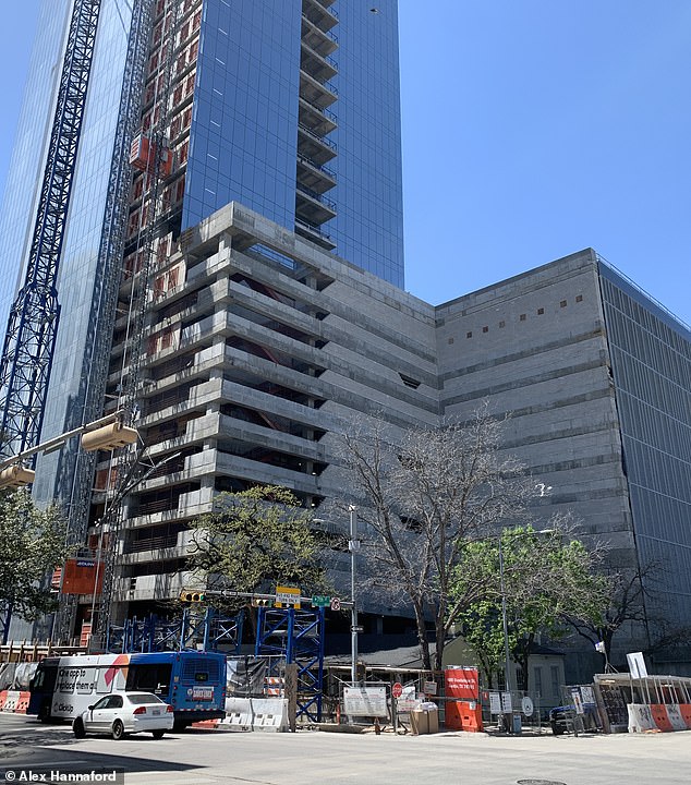 This photo of the former BJ Smith property overshadowed by office construction sums up Austin's growing problems, Hannaford says.