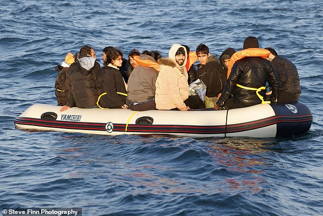 One also proudly declared himself a 'refugee' and the group cheered and shouted with joy as they approached Britain.