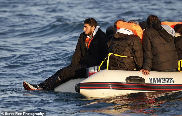 Several of those on board were wearing life jackets and one even swung his feet in the water while relaxing.