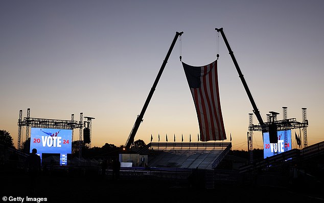 The sun rises backstage before a campaign rally for Republican presidential candidate, former United States President Donald Trump, at the Butler Farm Show Inc. on October 5, 2024 in Butler, Pennsylvania.