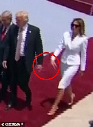 The former First Lady did not even flinch and continued with her step