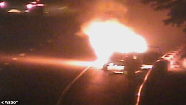 In the footage, the unnamed man appears to walk nonchalantly around his burning RAV4.