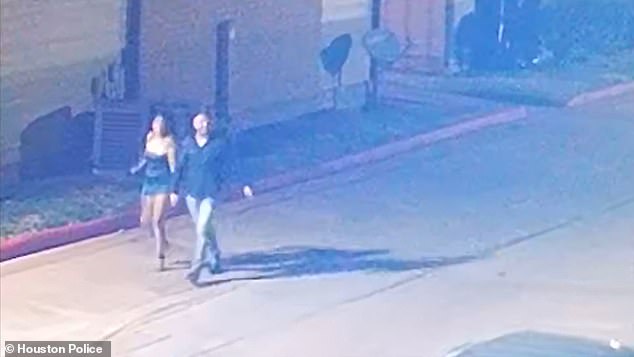 Disturbing CCTV footage captured her steps from her building at 2.47am on Monday, happily walking hand in hand with the man in a shirt and jeans.