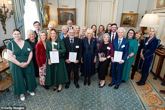 Queen Camilla with the winners of the inaugural Queen's Award for Osteoporosis at Clarence House on October 3