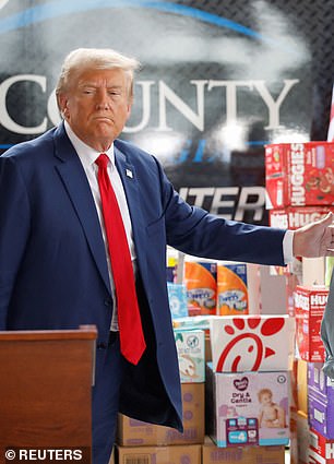 Republican presidential candidate and former US President Donald Trump spoke to reporters about the impact of Hurricane Helene in Evans, Georgia.