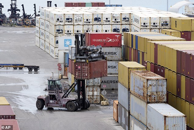 Dockworkers return to work at Port Miami on Friday after the union representing 45,000 striking American dockworkers at East and Gulf Coast ports reached an agreement to call off a three-day strike.