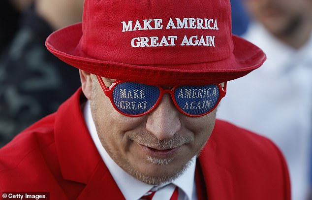 An attendee waits in line before a rally for Republican presidential candidate, former U.S. President Donald Trump, at Butler Farm Show Inc. on October 5, 2024 in Butler, Pennsylvania.