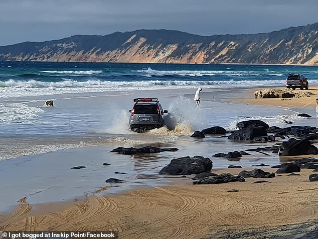 Mudlo Rocks, Rainbow Beach, almost three hours north of Brisbane, is a famous tide-dependent beach crossing. Many vehicles have been claimed in the area by the tide (Rainbow Beach file photo)