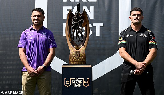 The Storm's Jahrome Hughes and the Panthers' Nathan Cleary perform on stage before the NRL Grand Final press conference in Sydney, Thursday, October 3, 2024. The Penrith Panthers will play the Melbourne Storm in the 2024 NRL Grand Final. (AAP Image/Dan Himbrechts) DO NOT ARCHIVE