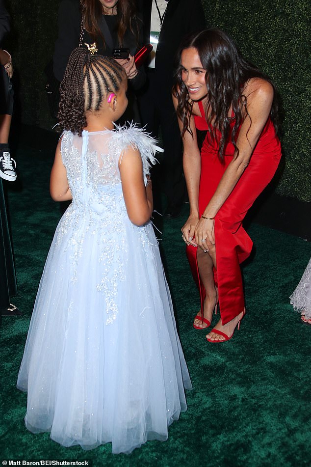 Markle was seen greeting a young fan at the LA Children's Hospital gala on Saturday night.