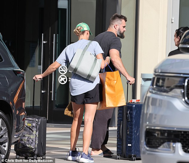 The former Eagles center and Kylie Kelce were seen carrying luggage to their hotel