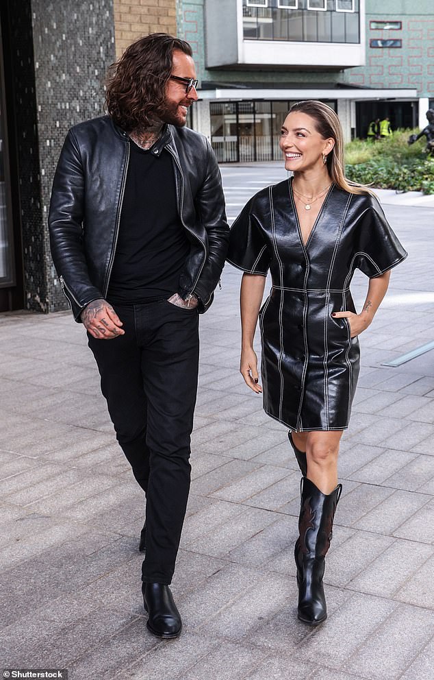 Peter and Jowita are seen in matching leather outfits as they leave the Television Center in London on October 2.