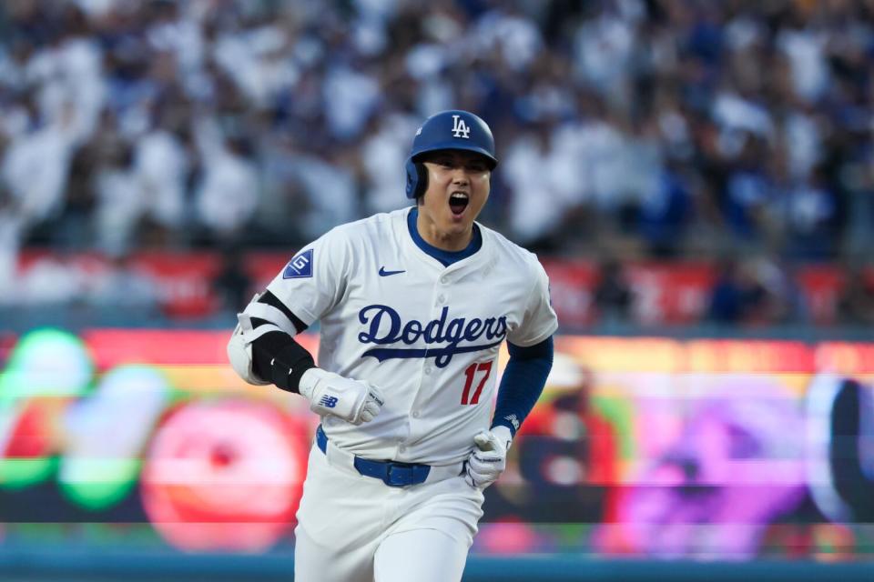 Shohei Ohtani celebrates after hitting a three-run home run in the second inning.