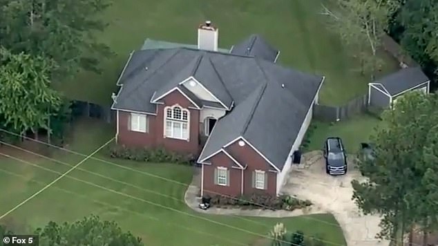 Authorities discovered the officer was alive a short distance from where the shooting took place in the 8000 block of Orkney Way, near the St. Andrews Golf Club. In the photo: the house where the incident occurred.