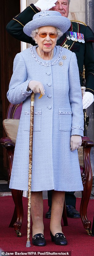 The Queen wore a cornflower blue dress to the Reddendo Parade of the Royal Company of Archers, held in the gardens of the Palace of Holyroodhouse, in June 2022.