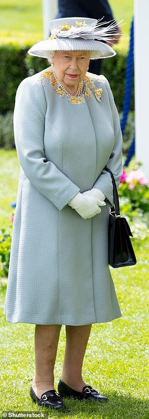 Queen Elizabeth donned a lovely blue-gray ensemble in June 2019