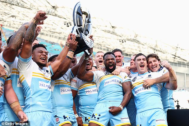 The Norths Devils celebrate after beating the Newtown Jets in the NRL State Championship