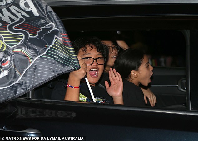 Many of those reveling also waved the iconic Penrith flag, which depicts the legendary western Sydney panther.