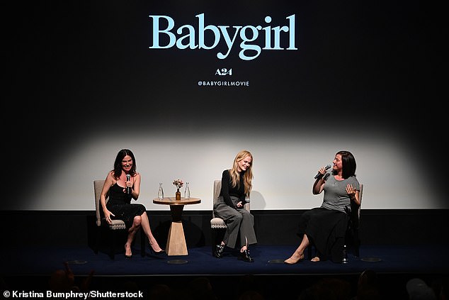 At the event, Esther looks chic in an oversized blue shirt and gray pants, while Nicole rocked a black turtleneck.