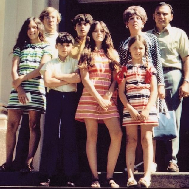 Madonna, center, in 1970 with, from left, sister Paula, uncle Chris, brothers Christopher and Marty, sister Melanie, stepmother Joan and father Silvio.