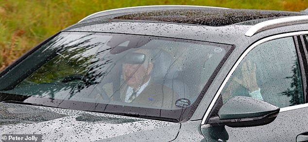 The couple looked in high spirits as they enjoyed a weekend away despite the rainy weather. Charles appeared to be wearing a sage green jacket and striped tie, while Camilla, 77, opted for a blue ensemble with what appears to be a tartan collar.