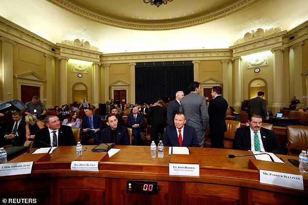 Commander Edward Lenz of the Butler County Emergency Services Unit, Trooper Drew Blasko of the Butler Township Police Department, Lt. John Herold of the Pennsylvania State Police and Patrick Sullivan attend a Task Force hearing. the House on the attempted assassination of Donald Trump