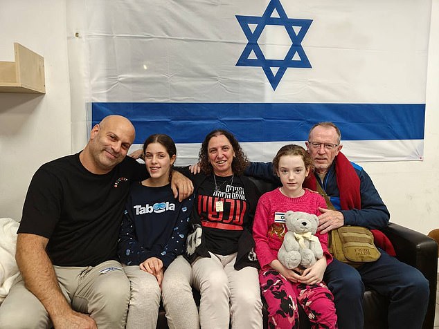 Emily is shown meeting her father, while Hila Rotem (second from left), whose mother is still being held hostage, meets with a family member.