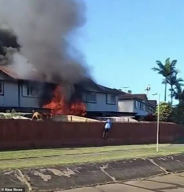 Firefighters managed to extinguish the fire (pictured) around 8am, but searches of the property were delayed after the roof of the house collapsed.