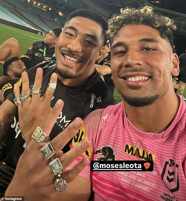 Moses Leota (left) and Izack Tago (right) also showed off their extensive collections of football jewelry in a tell-tale sign that the team was confident of victory.