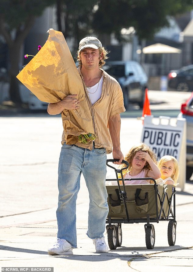 White carried the flowers in her arms back home while dragging her daughters in the wagon.