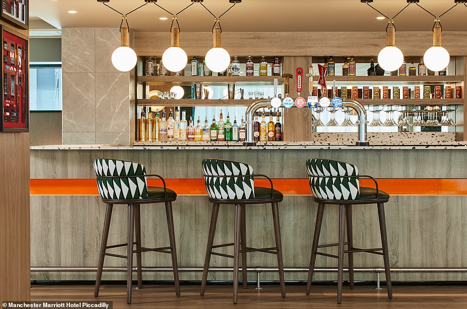 The elegant bar on the lobby floor, with craft cocktails among the drinks on offer.