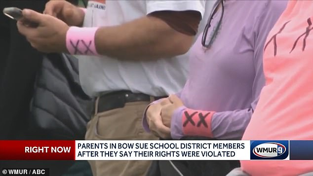 Some fans even wore their own pink armbands at another soccer match.